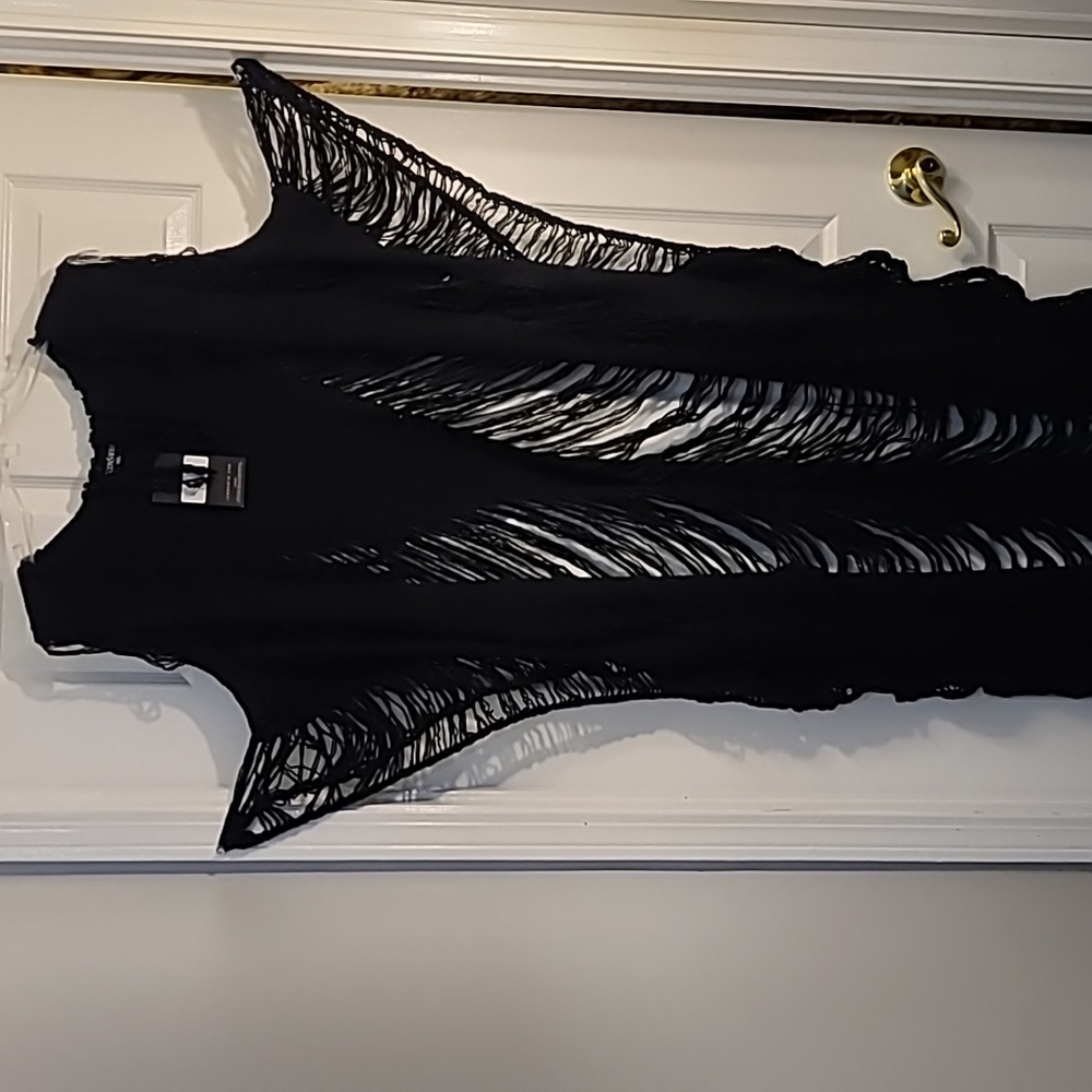 Black knit beach cover-up. This is a long cover-up.